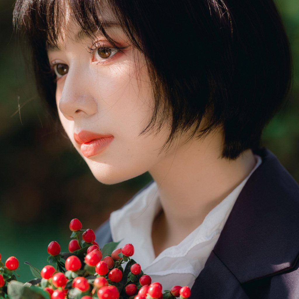 A woman with a luminous, radiant complexion, representing the results of a clinical skin brightening treatment at Medinova.